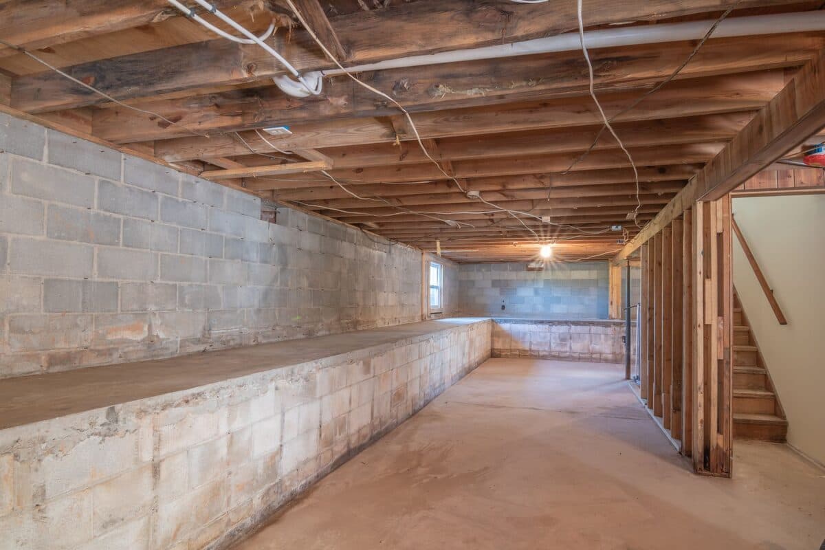 A block-wall basement foundation interior in an older home